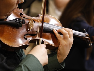 Солист оркестра